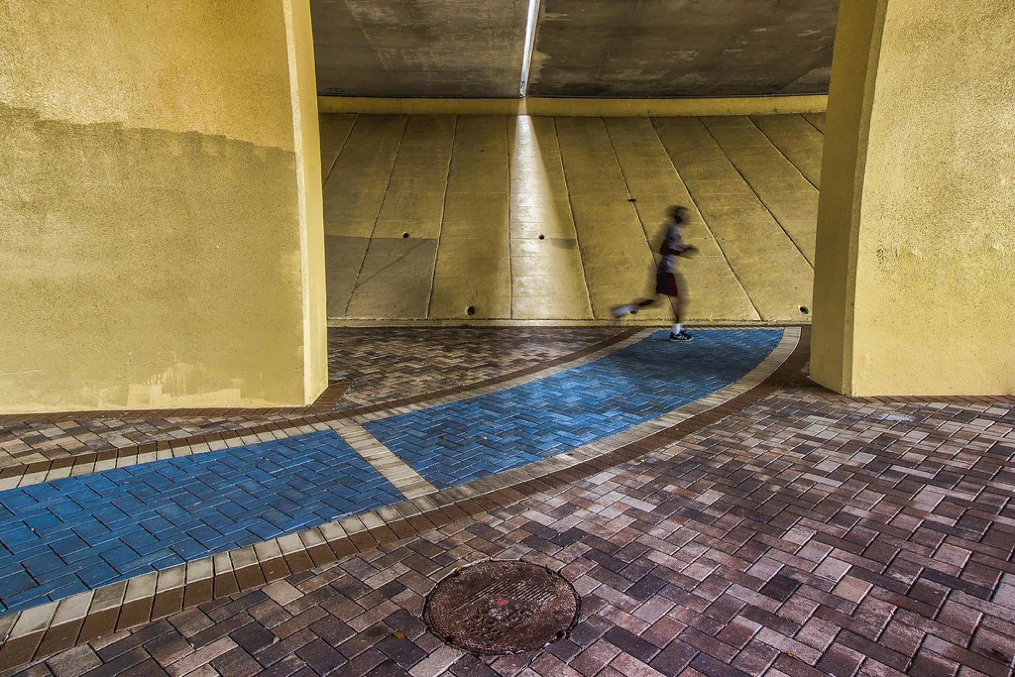 A runner under the bridge. Misc photography by Robin Mehdee, South Florida.